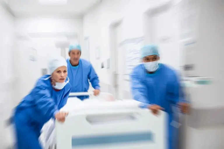 Doctors rushing a patient