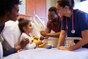 A happy family and a nurse